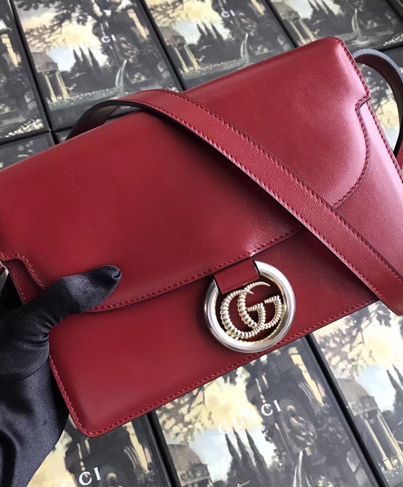 red gucci man bag