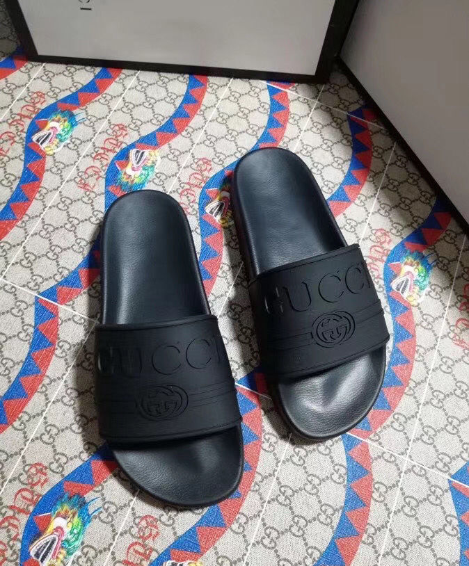 Gucci Unisex Gucci logo rubber slide sandal Black - Image 2