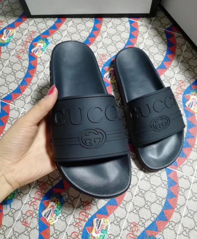 Gucci Unisex Gucci logo rubber slide sandal Black - Image 3