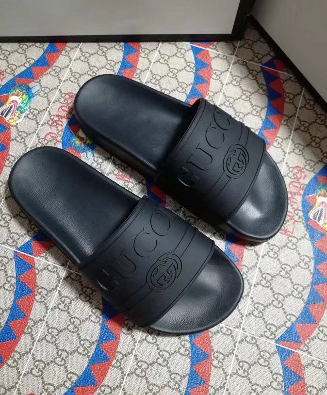 Gucci Unisex Gucci logo rubber slide sandal Black - Image 4