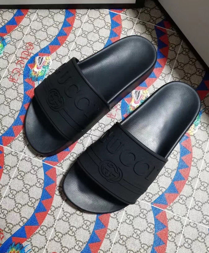 Gucci Unisex Gucci logo rubber slide sandal Black - Image 5