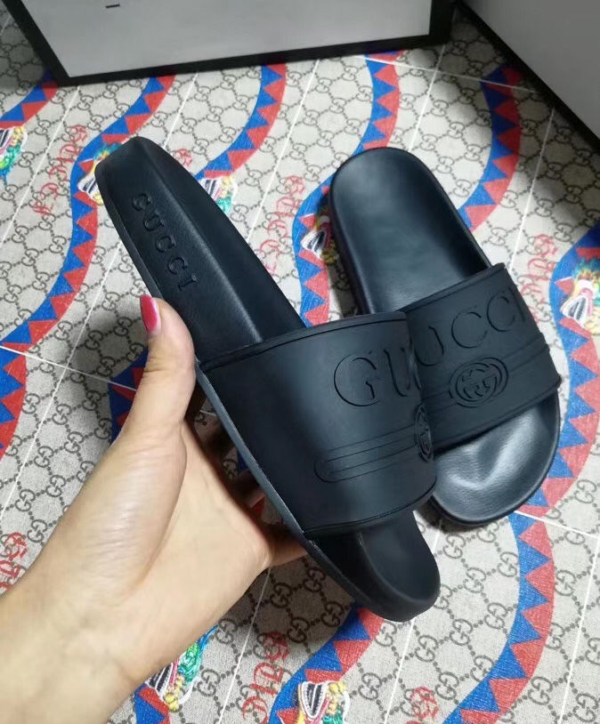 Gucci Unisex Gucci logo rubber slide sandal Black - Image 6