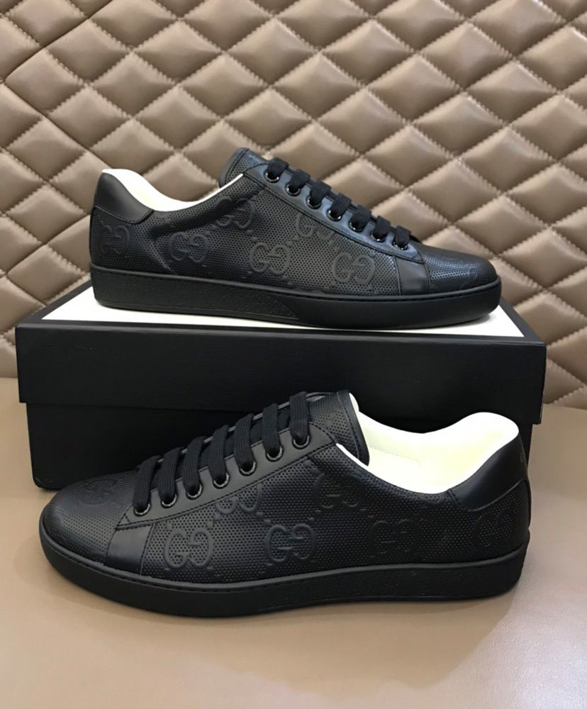 Gucci Unisex Ace GG embossed sneaker Black - AlimorLuxury