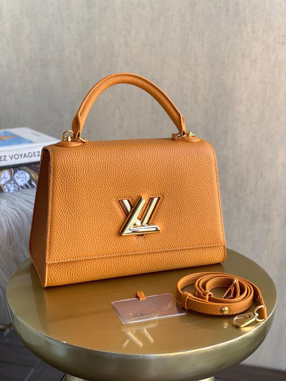 LV TWIST ONE HANDLE ORANGE BAG MM AlimorLuxury