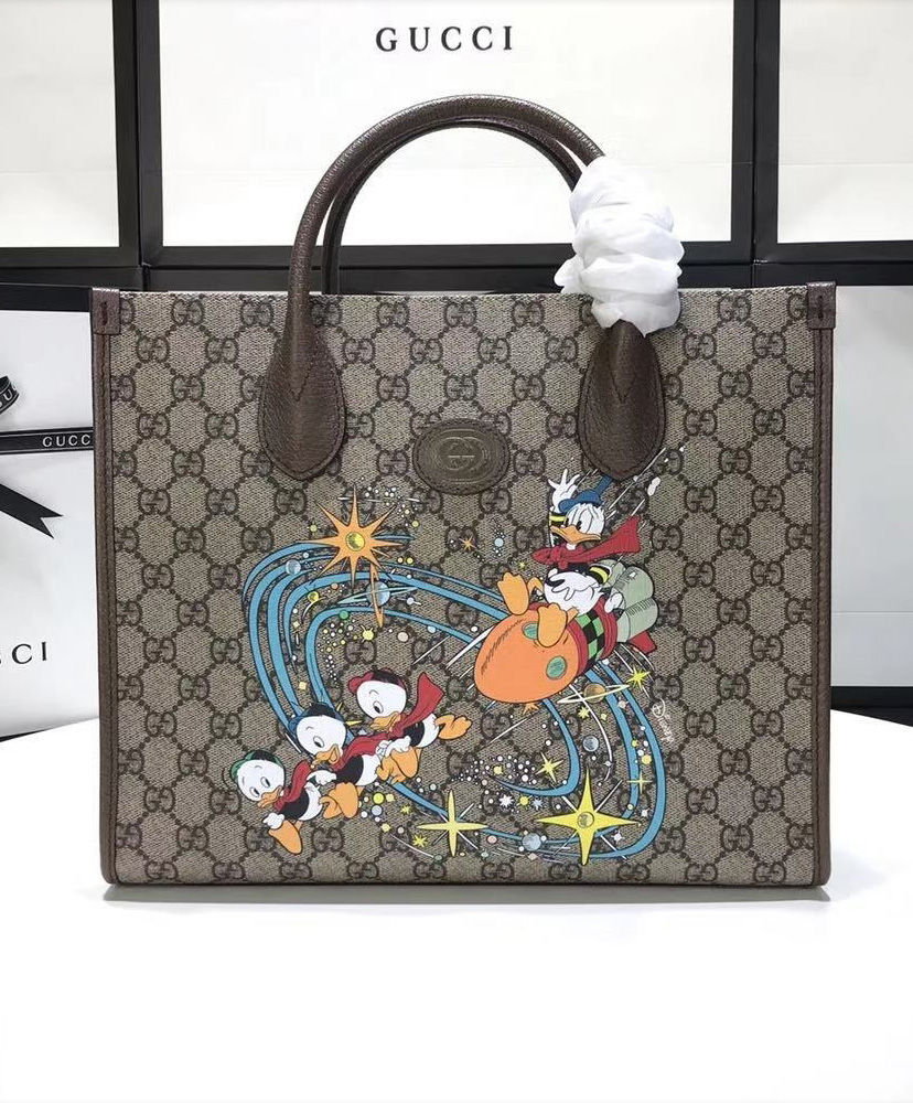 gucci donald duck duffle bag