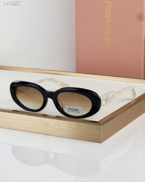 Miu Miu Women's Sunglasses SMU C01